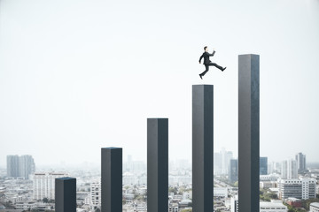 Canvas Print - Businessman jumping on stock chart on modern city background