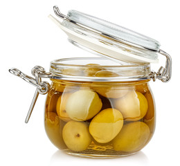 Whole green olives in brine in a open transparent glass jar with rubber seal and metal clamp on lid isolated on white background