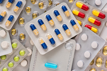 Selection of different pills in form of tablets and capsules. Drug prescription for treatment medication.
Pharmacy drugstore.