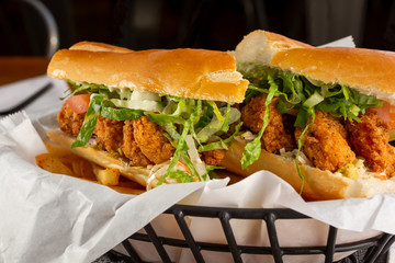 Wall Mural - A view of a Po' Boy Sandwich, in a restaurant or kitchen setting.