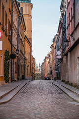 Wall Mural - Street in the old town of Warsaw. Street without people with colorful buildings of the old town