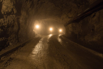 Canvas Print - Underground magnezite mine tunnel with fog and light