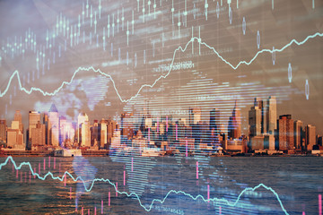 Forex chart on cityscape with tall buildings background multi exposure. Financial research concept.