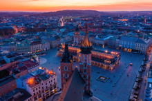 Krakow Main Square And St Mary Basilica At Dusk Aerial Drone View