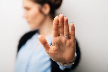 The woman gestured stop timeout. Isolated on a white background