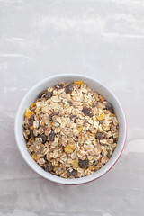 Sticker - dry muesli in the bowl on ceramic background