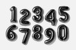 © SEE D JAN - Set of numbers 0-9, Black foil balloon number isolated on a white background with Clipping Path