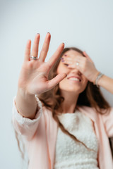 Wall Mural - girl shows stop and turn a blind eye