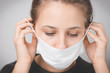 Woman wearing medical mask. Protection against viruses and infections. Stay home, corona virus.