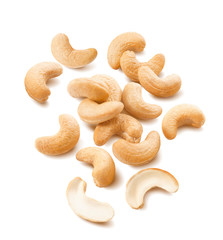 Wall Mural - cashew nuts scatter isolated on white background. package design element with clipping path