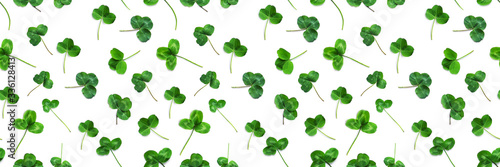 Green clover, the symbol of the holiday St. patrick's day. Seamless pattern o...