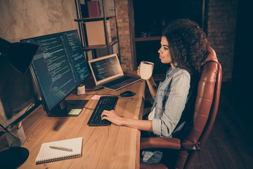 Profile side photo professional dark skin girl web administrator sit evening desk want pause she need work framework operating system research hold drink mug beverage in workplace workstation
