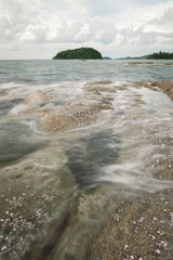 Wall Mural - Long exposure sea and rocks at twilight