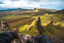 Trekker Admires The Wild Landscape Of Quiraing, Trotternish Peninsula In The Isle Of Skye, Highands, Scotland, United Kingdom, Europe