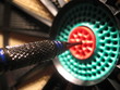 © Gonzalo - dart in the center of the dartboard