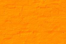 Saffron Plastered Brick Wall Texture.