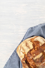 Wall Mural - Fresh organic home made bread. Healthy eating, buy local, bread recipes concept. Top view
