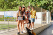 © ALTO IMAGES/Stocksy - Teenagers relaxing on a school break