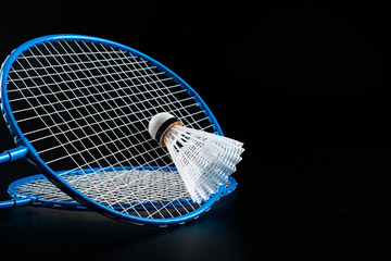 Wall Mural - Badminton sport equipment on dark black background close up