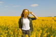 © Danil Nevsky/Stocksy - Young woman walking in the flower field