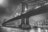 Fototapeta  - Amazing night view of Manhattan and Brooklyn Bridge at night, winter season, New York City
