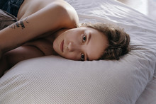 Topless Chubby Woman Lying On Bed
