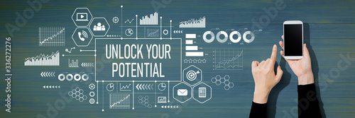 Fotografía Unlock your potential with person using a white smartphone