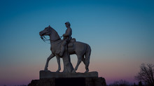 Horse And Rider Statue In Gettysburg At Sunset