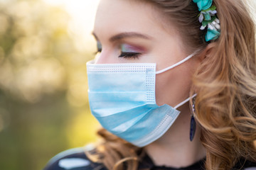 spring portraits in surgical mask during quarantine