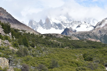 Wall Mural - Hiking Trail to the Laguna de Los Tres in National Park in El Chalten, Argentina, Patagonia with snow covered Fitz Roy Mountain in background