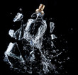A glass perfume bottle shatters on a black background with splashes and drops of water