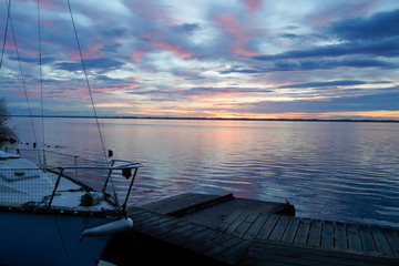 sunset marina boats in blue water lake of biscarrosse landes france