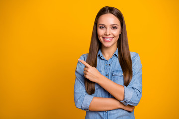 Poster - Portrait of positive cheerful girl promoter present ads promo suggest select sales discount wear good look clothes isolated over bright color background