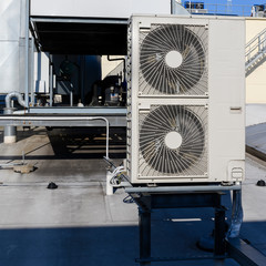 Wall Mural - Air conditioning unit with fans on the beam.