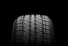 A  Black Isolation Rubber Tire, On The Black Backgrounds