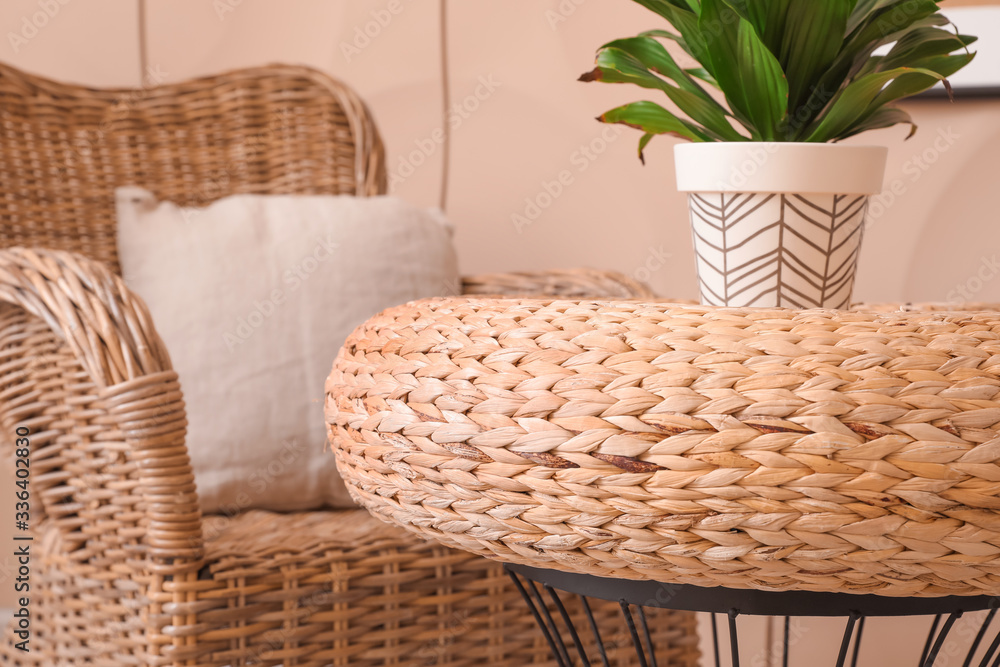 Stylish wicker furniture in room