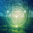 © VeronikaBy - Merkaba sacred geometry spiritual new age futuristic illustration with interlocking circles, triangles and glowing particles in front of blurry natural photographic background