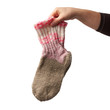 © nndanko - female hand holds a pair of knitted woolen socks, warm clothes