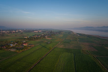 Aerial View Agriculture Along The Mekong River At Sunrise In Thailand