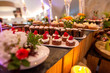 © hreniuca - Delicious candy bar with macaroons, cupcakes and other sweets