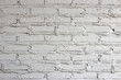 © Yanukit - white background from brick and cement texture