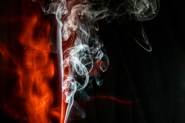 puffs of white and red smoke with a black background