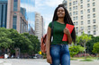 © Daniel Ernst - Laughing african american female student with braid and copy space