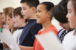 © highwaystarz - Group Of School Children Singing In Choir At Stage School Together