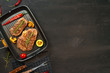 © fotofabrika - Beef steaks with vegetables on grill pan, top view
