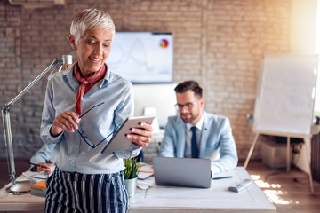 Business woman using  tablet in office