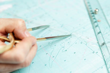 Measuring Distance On A Sea Chart Tool. Close-up. Navigation In The Maritime Industry And Yachting.
