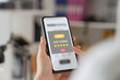 © sompong - Hand holding smartphone and rate your feedback and show five star on application.