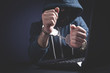 © andranik123 - Hacker in handcuffs with laptop. Cyber crime