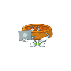 Sticker - Diligent peanut cookies mascot design style working from home with laptop